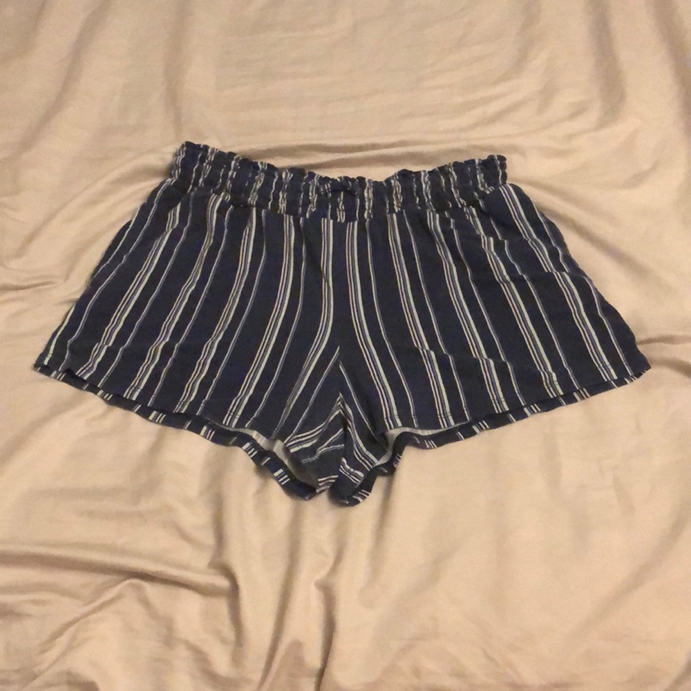 Navy blue with white stripes, elastic and with strings